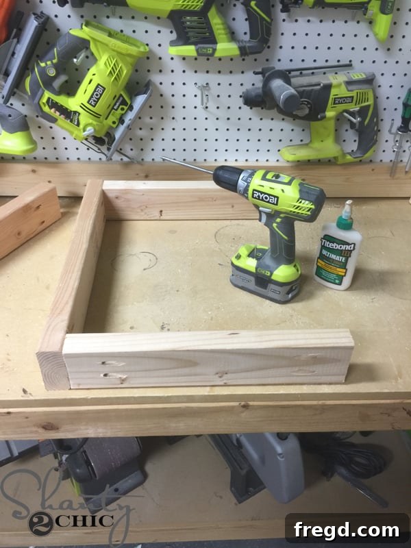 Build Your Own Rolling Storage Ottoman Coffee Table 18 Partially assembled table base with visible pocket holes, showing the initial wooden components joined together.