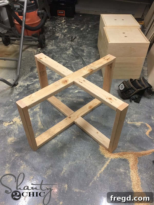 Build Your Own Rolling Storage Ottoman Coffee Table 21 The fully assembled and robust wooden frame of the coffee table base, showcasing its structural integrity.