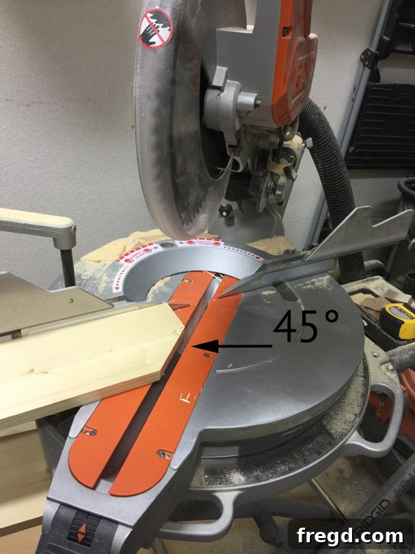 Build Your Own Rolling Storage Ottoman Coffee Table 25 A wooden plank with a precisely cut 45-degree angle on one end, ready for assembly into a pattern.
