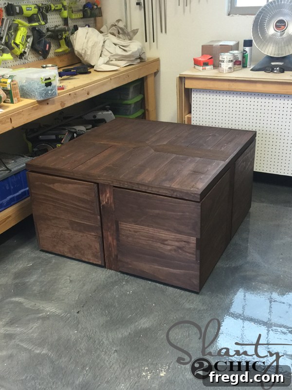 Build Your Own Rolling Storage Ottoman Coffee Table 35 The finished DIY Rolling Storage Ottoman Coffee Table, showcasing its rich stain and protective topcoat, gleaming under natural light.