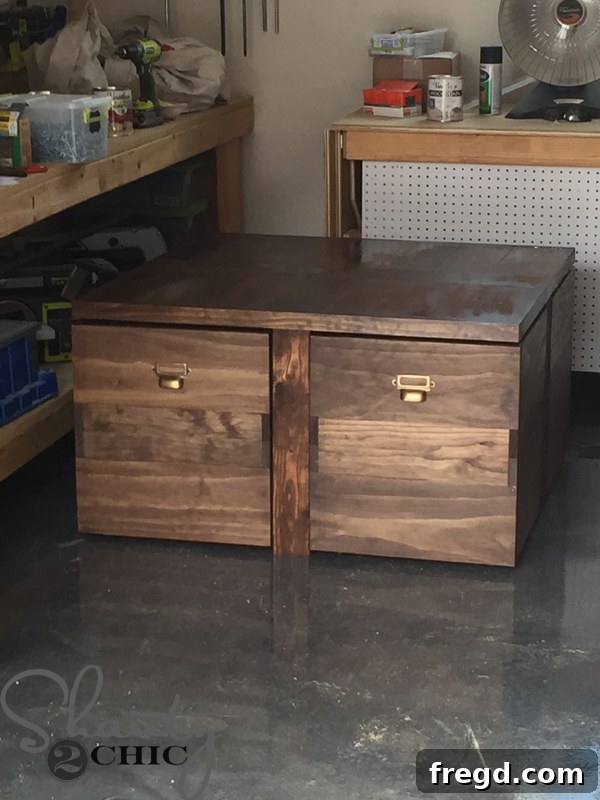 Build Your Own Rolling Storage Ottoman Coffee Table 36 A beautifully finished DIY Rolling Storage Ottoman Coffee Table with its ottomans pulled out slightly, showing off new label cup pulls.