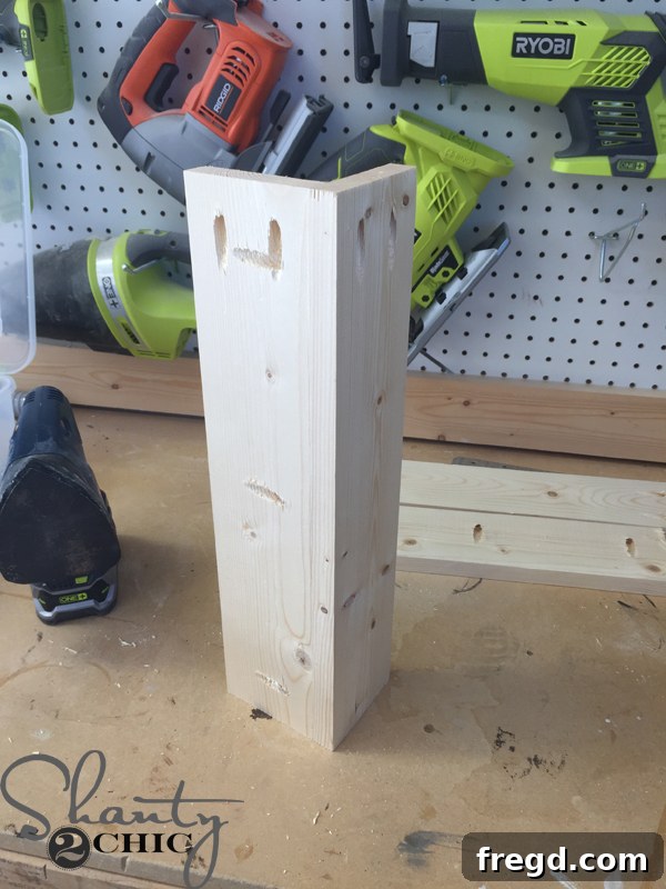 Build Your Own Rolling Storage Ottoman Coffee Table 6 A collection of wooden 'L' supports, each perfectly drilled with pocket holes, laid out and ready for the next stage of assembly.