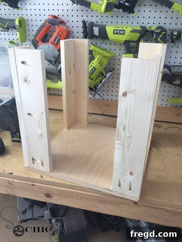 Build Your Own Rolling Storage Ottoman Coffee Table 8 Four perfectly assembled 'L' shaped wooden supports, neatly stacked and ready for the next phase of ottoman construction.