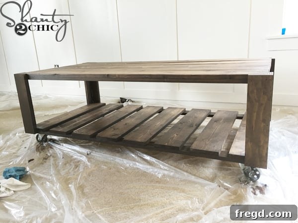 Rolling Crate Coffee Hub 18 Stained wooden coffee table drying