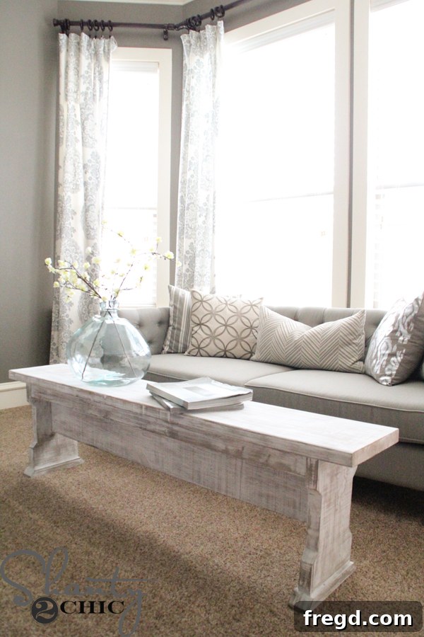 Furniture piece with a rugged Barn Wood Finish, featuring greyed tones and textured surface for a rustic look