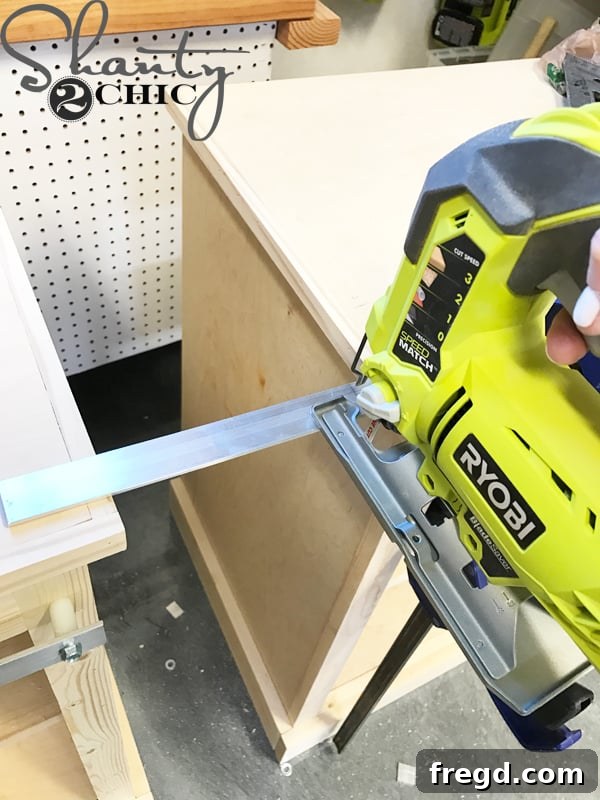 Make Your Own Barn Door Hardware for Just $20 12 Clamping the aluminum flat bar for cutting