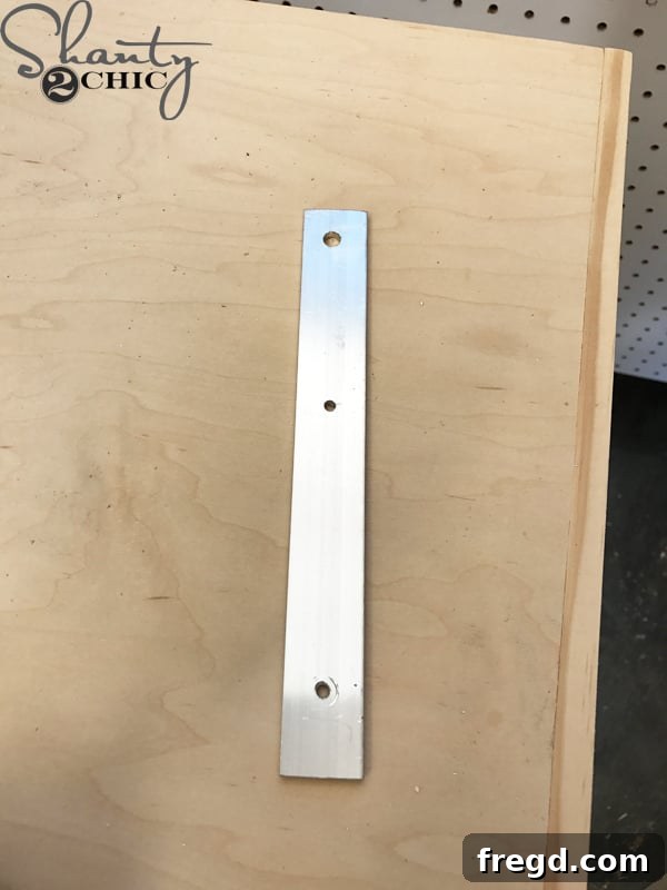Make Your Own Barn Door Hardware for Just $20 13 Cleanly cut aluminum flat bar sections