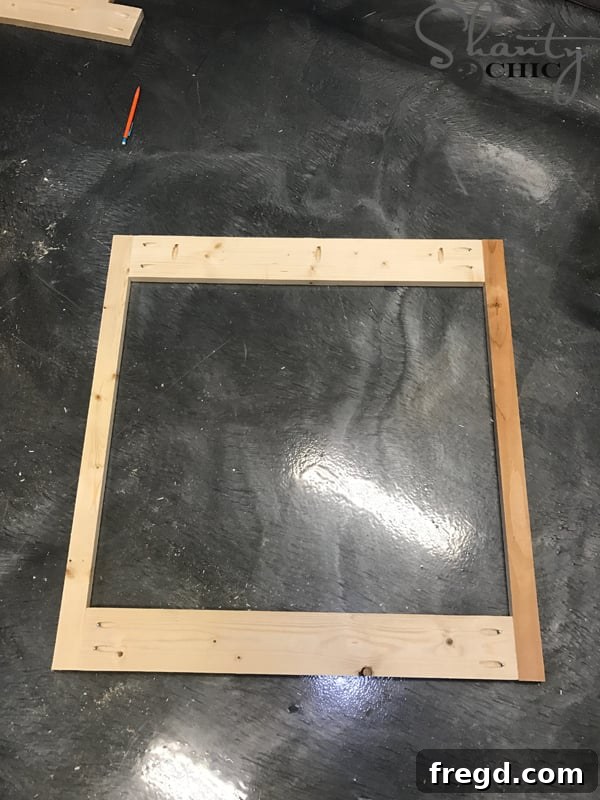 Craft Your Own Sliding Barn Door Nightstand 15 Back view of the assembled face frame, showing pocket hole placement