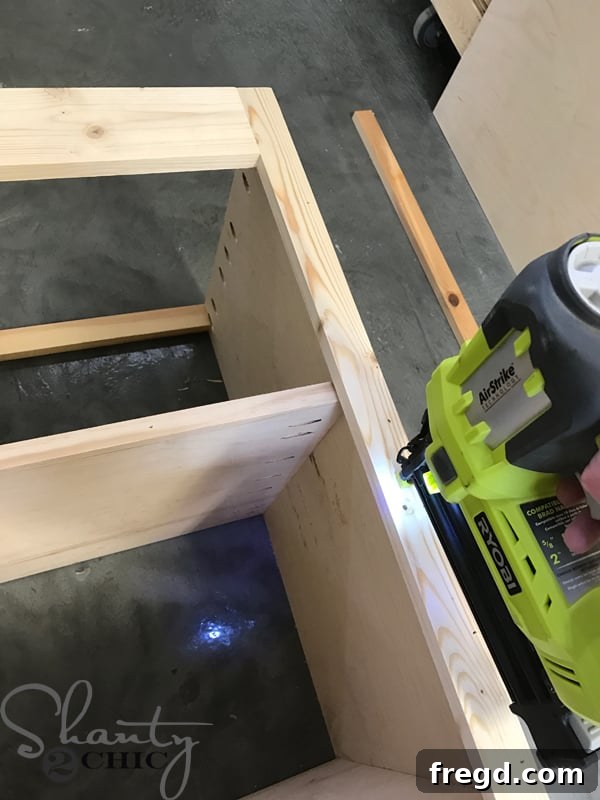 Craft Your Own Sliding Barn Door Nightstand 16 Attaching the assembled face frame to the main nightstand structure
