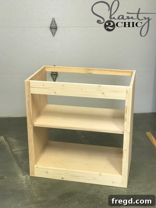 Craft Your Own Sliding Barn Door Nightstand 17 Nightstand with the face frame successfully attached, showing the completed front structure