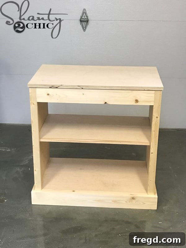 Craft Your Own Sliding Barn Door Nightstand 21 Nightstand right-side up after top attachment, ready for trim