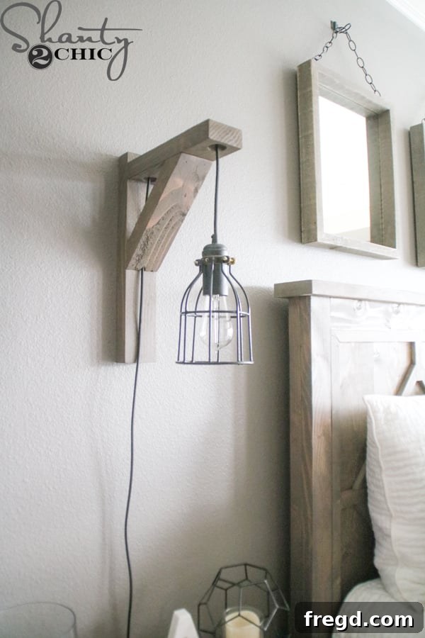 Build Your Own Corbel Sconce for Just $25 9 A pair of DIY Corbel Sconce Lights flanking a bed, highlighting their bedroom functionality.