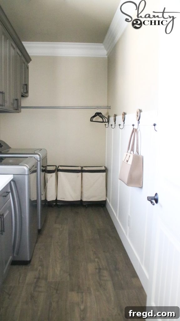Full shot of the transformed laundry space, bright and inviting