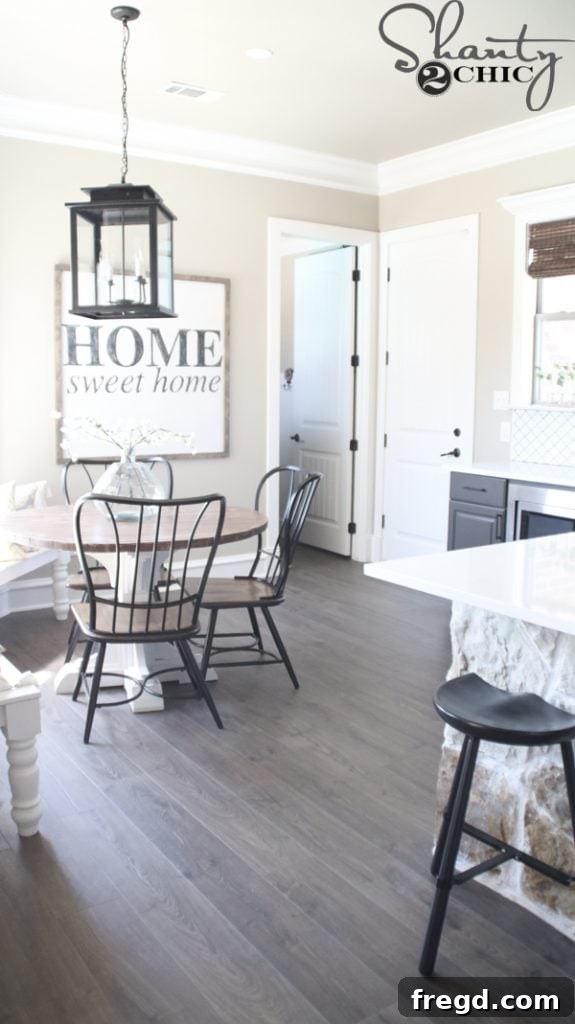 Detailed view of the flooring extending into the laundry room