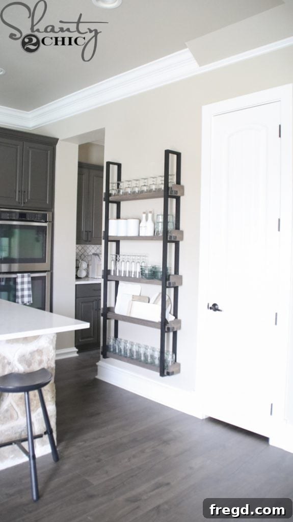 Kitchen Upgrade: DIY Floating Dish Shelf Tutorial 30 Close-up of the DIY floating plate rack filled with elegant dinnerware and decor