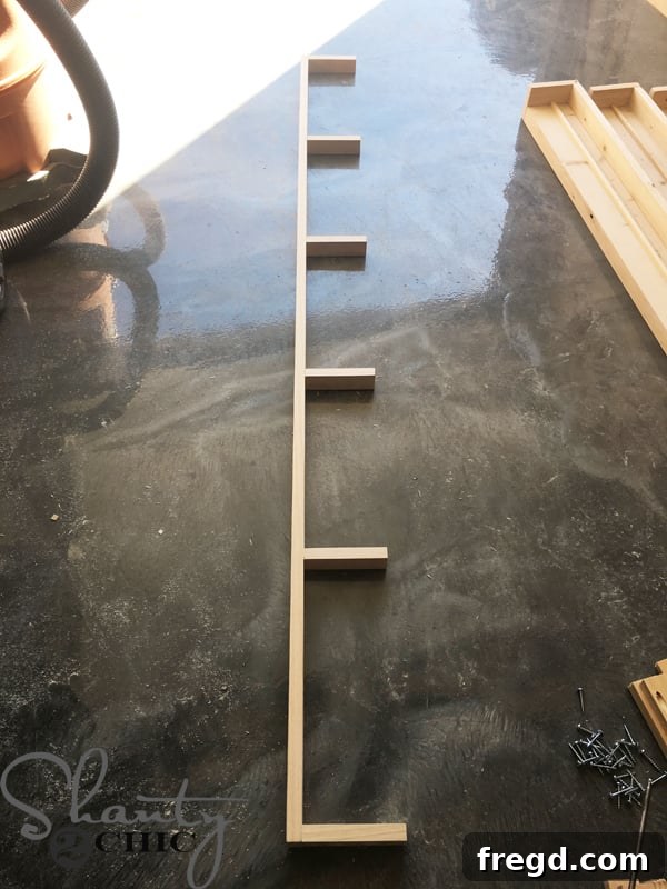 Kitchen Upgrade: DIY Floating Dish Shelf Tutorial 7 Assembling the side of the ladder frame using pocket holes and screws