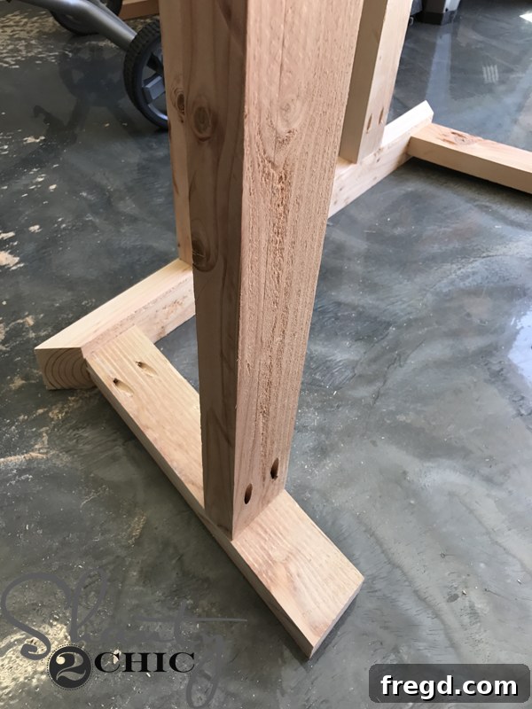 Attaching second leg assembly to supports