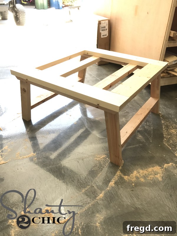 Attaching base to top frame for outdoor table