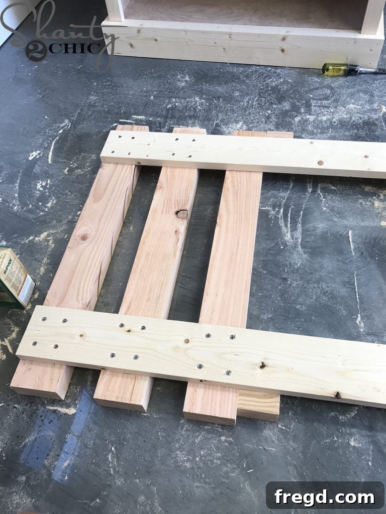 Using a spacer block to ensure even spacing between back slats during assembly, creating a uniform and comfortable backrest for the lounge chair.