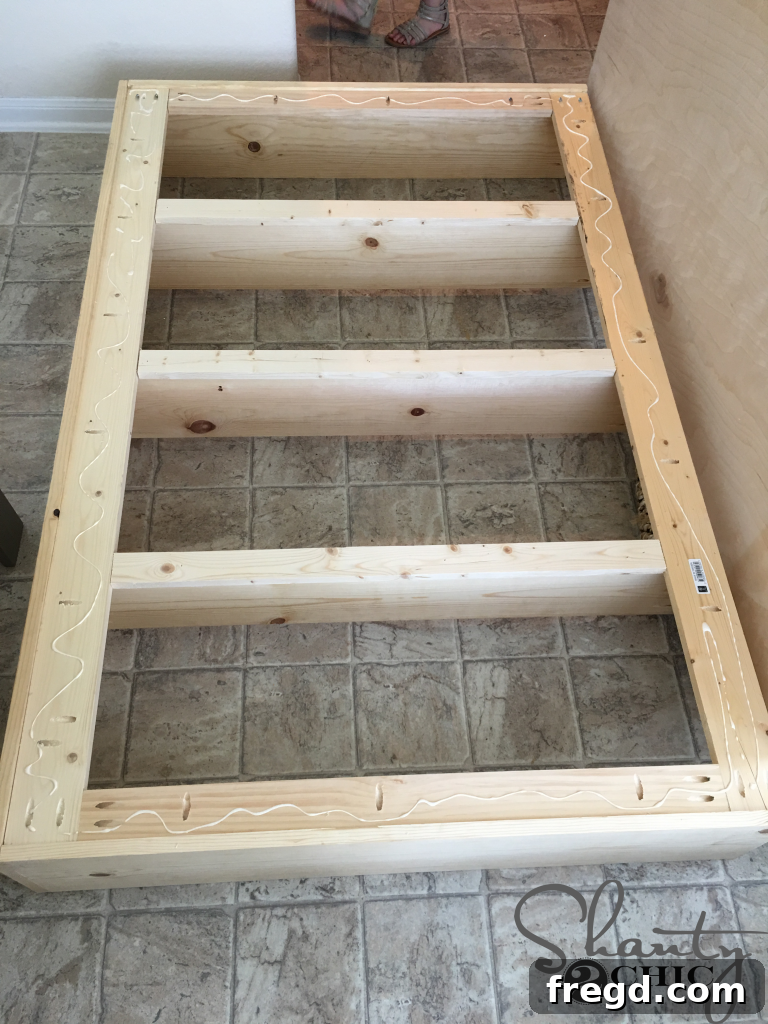 Applying Wood Glue Before Attaching Plywood Backing