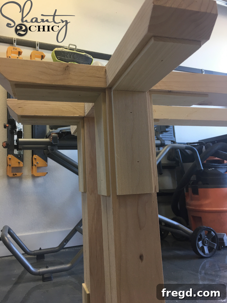 Trim attached to the Top of the Legs, completing the aesthetic detailing of the base.