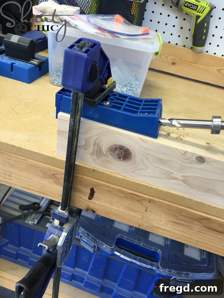 Using a Kreg HD jig for drilling large pocket holes in thick laminated wood pieces.
