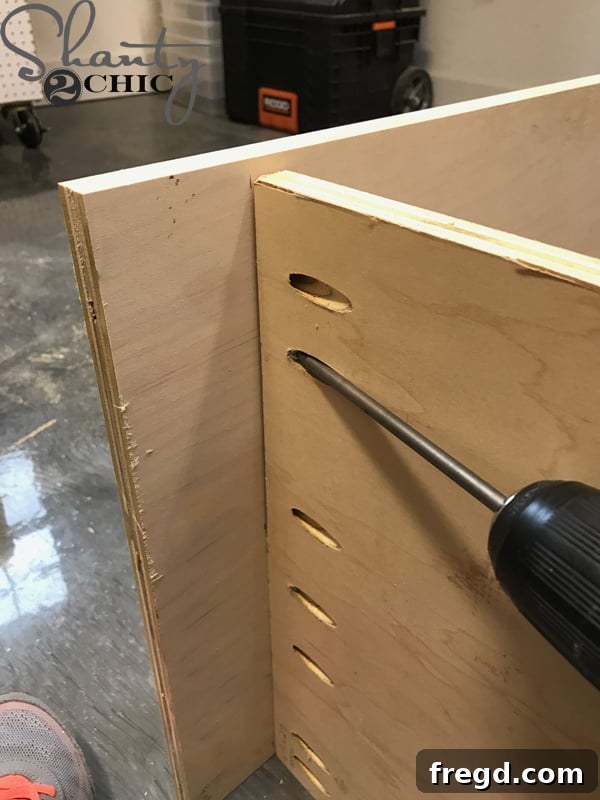 Rustic Coffee Station with Sliding Door 4 Drilling pocket holes for shelves