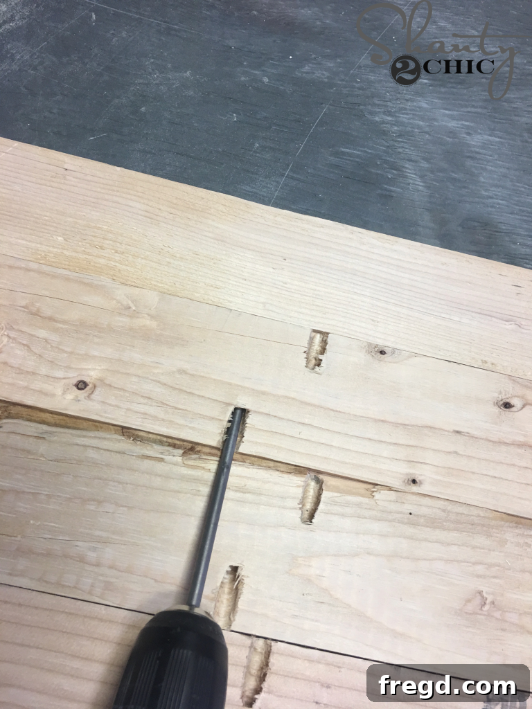 Attaching the top support assembly to the legs of the bench frame