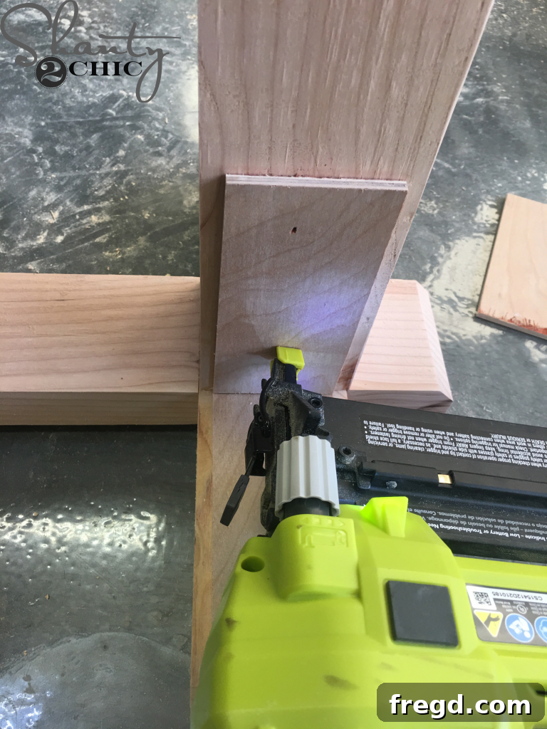 Attaching bottom craft boards flush with the legs using brad nails and glue