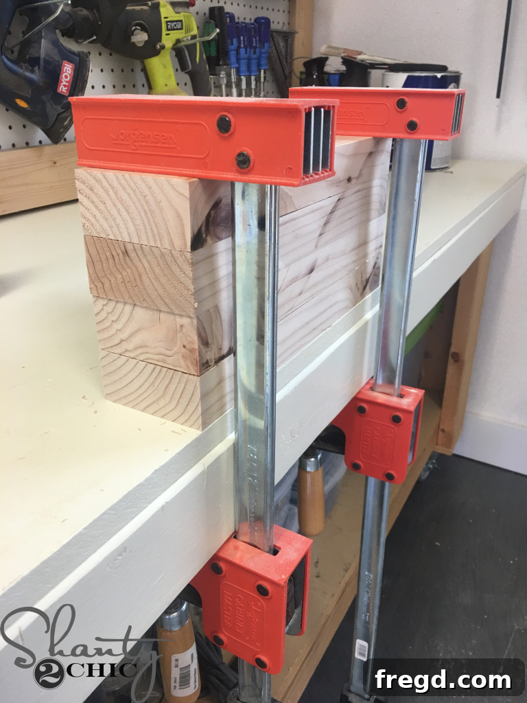 Ripping the edges of 2x4 lumber for the DIY Industrial Corbel Dining Bench