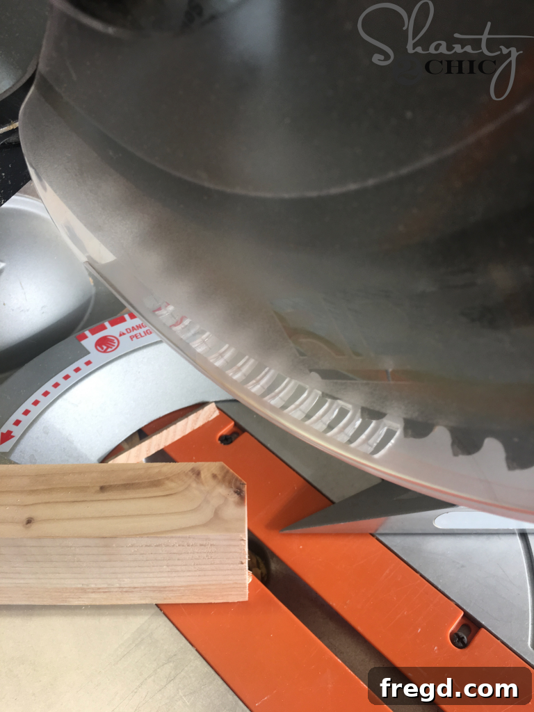 Cutting the top corners of the end supports and feet with a miter saw