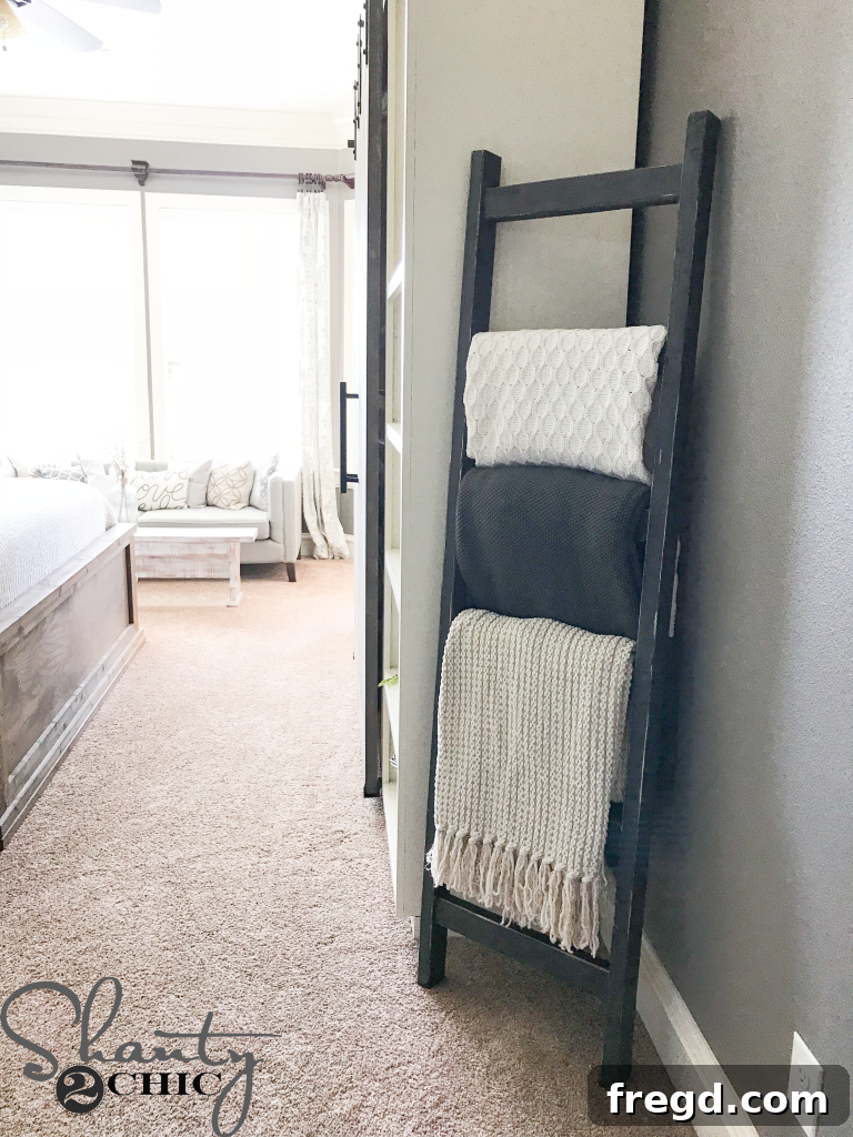 Finished rustic blanket ladder leaning against a wall