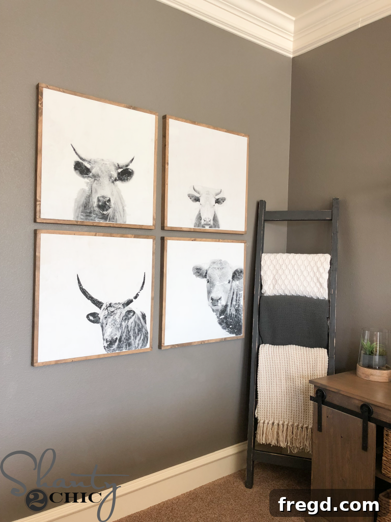 Attaching the stained wood trim to complete the framed DIY cow print artwork