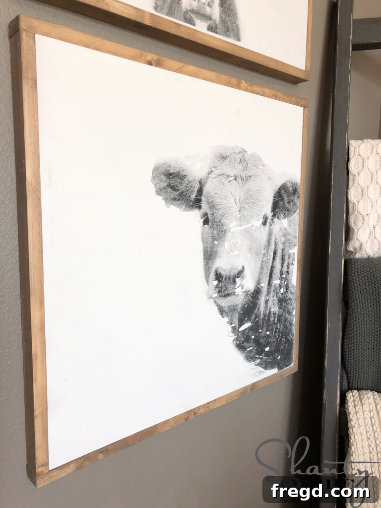 Close-up of a DIY cow print adding character to a rustic-themed bedroom