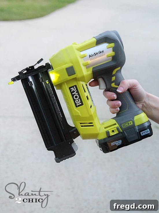 Close-up of an 18-volt miter saw making a wood cut
