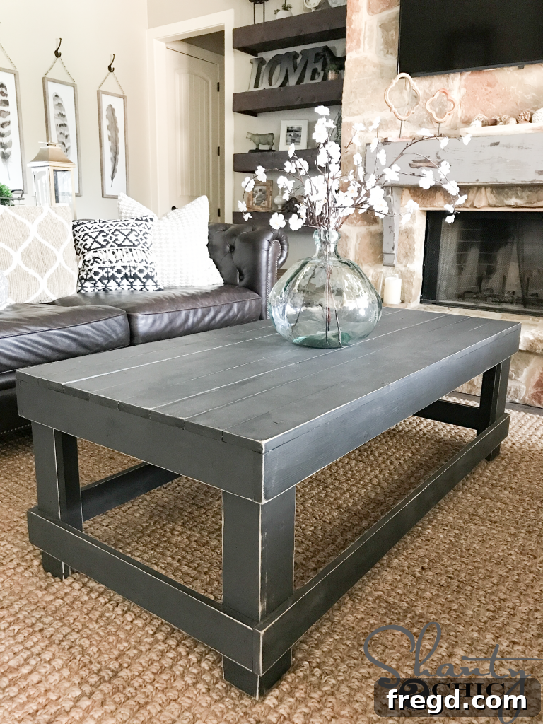 Completed 'Table for Two' coffee table with rustic finish in a living room