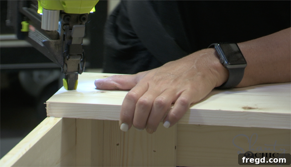 Attaching internal supports to the coffee table frame for tabletop stability