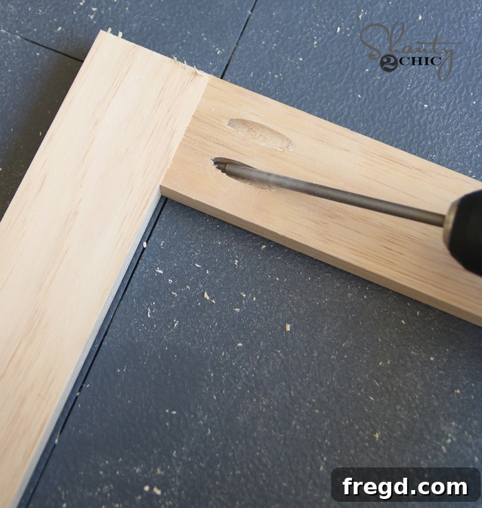 Detailed view of door frame construction with pocket hole joinery
