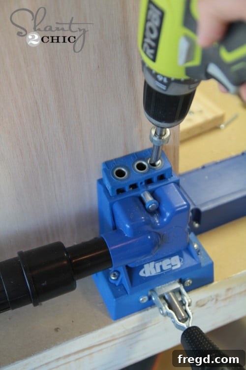 Building the Cabinet Box: Attaching base to side panels with Kreg Jig pocket holes