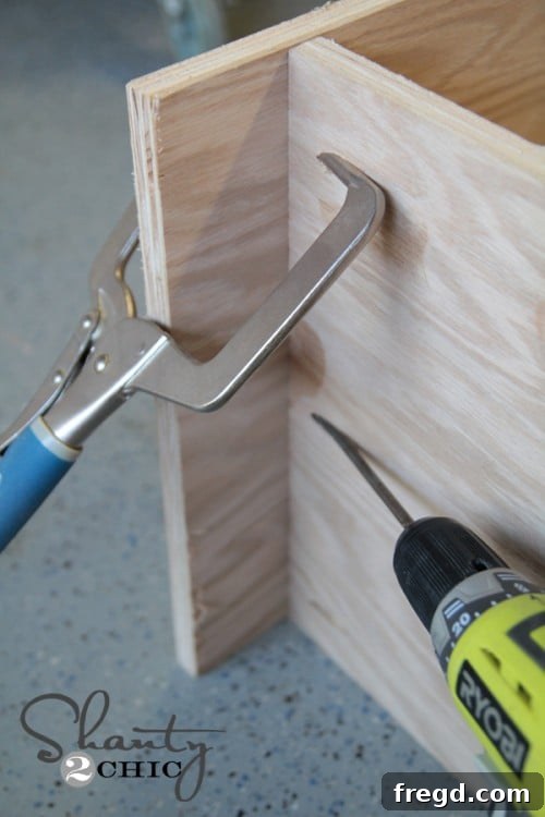 Close-up of Kreg Jig Pocket Holes for cabinet base assembly