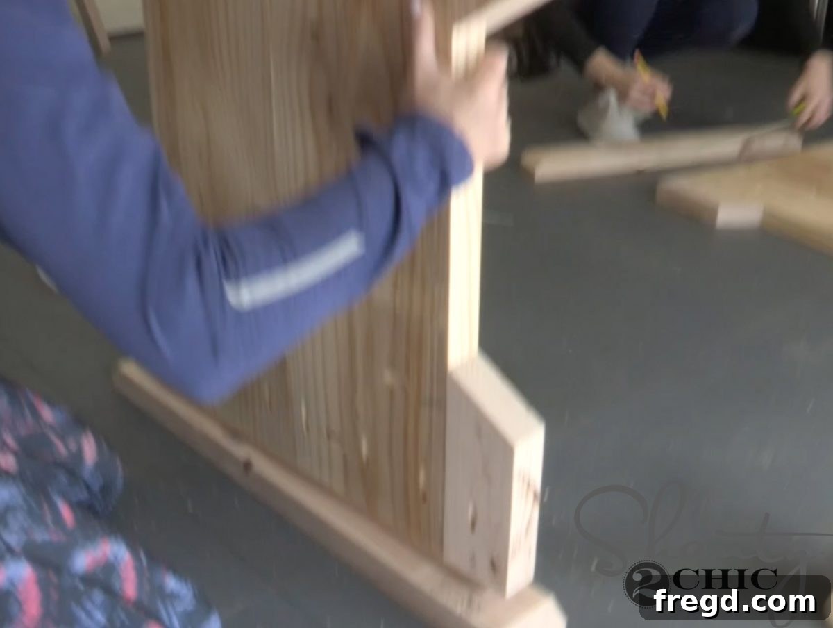 Create Your Farmhouse Dining Table and Pew Bench Free Guide 9 Connecting leg bases to feet for stability
