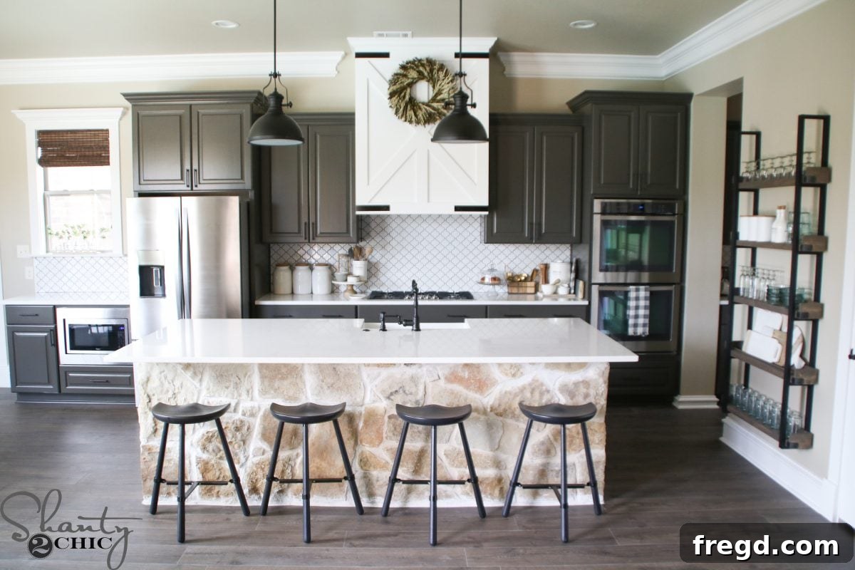 Craft Your Own Barn Door Range Hood 14 DIY Barn Door Vent Hood - An Easy Modification To Your Kitchen!: The finished vent hood with painted corner braces and hex screws.