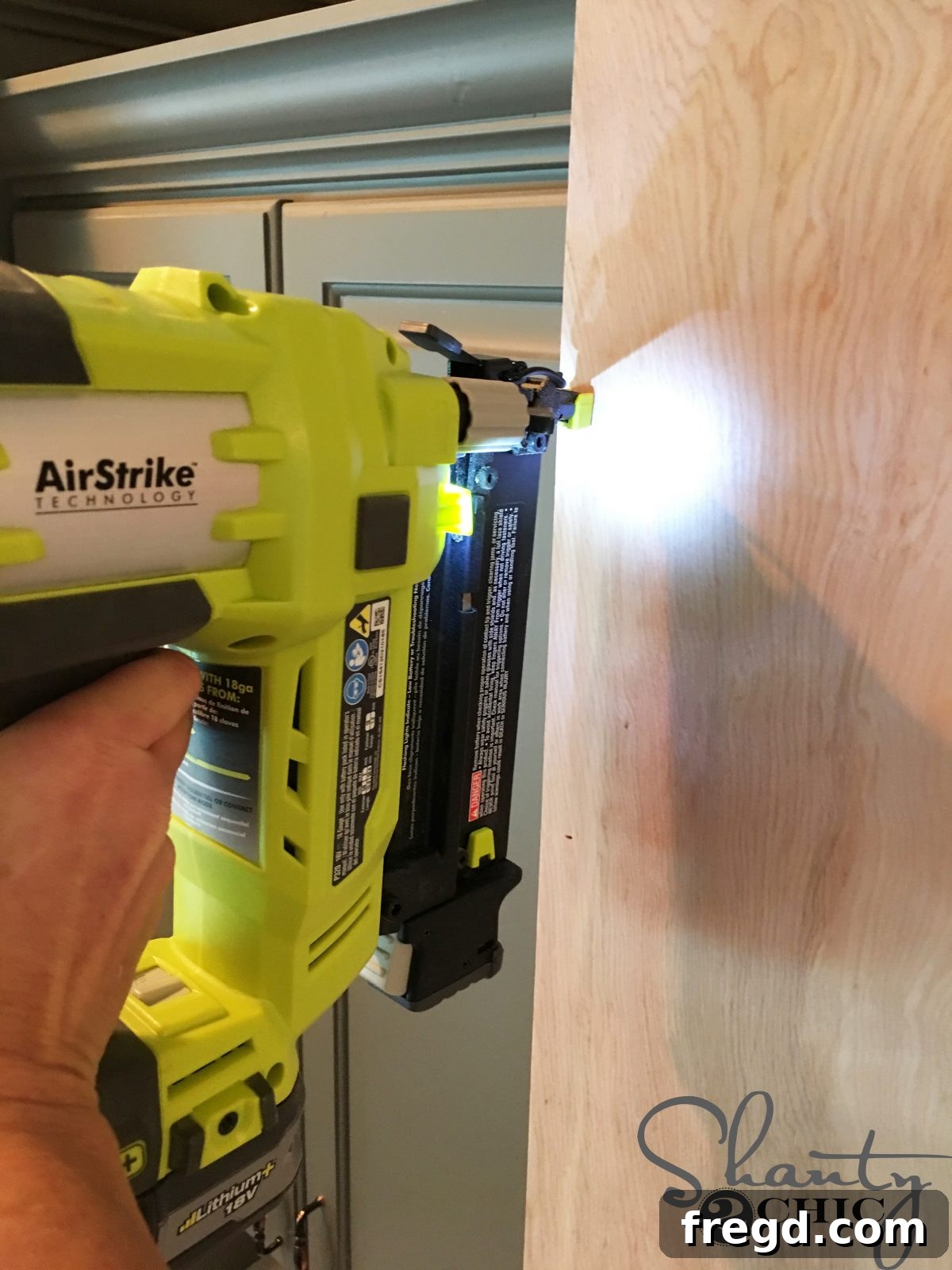 Craft Your Own Barn Door Range Hood 4 Cutting the 1/4 inch hardwood plywood to precisely fit the cabinet face frame for the vent hood.