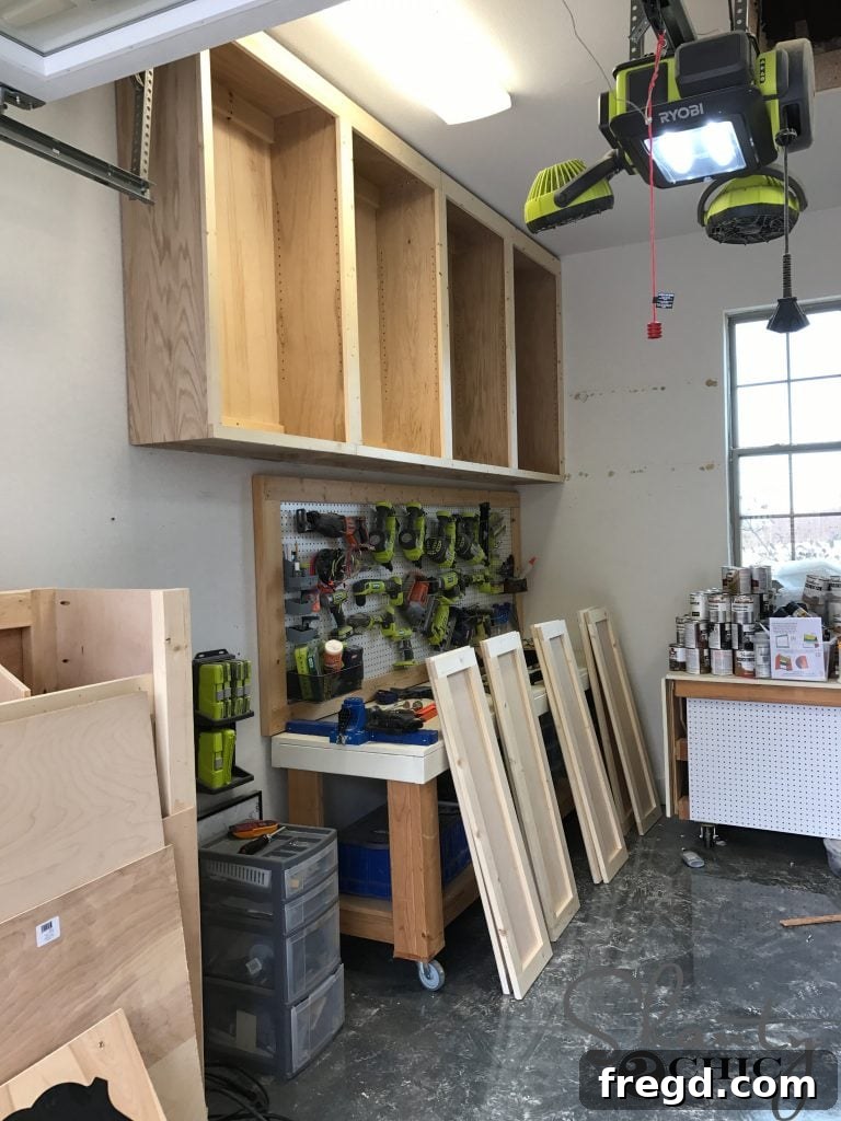 Securing DIY cabinet to wall studs through back braces