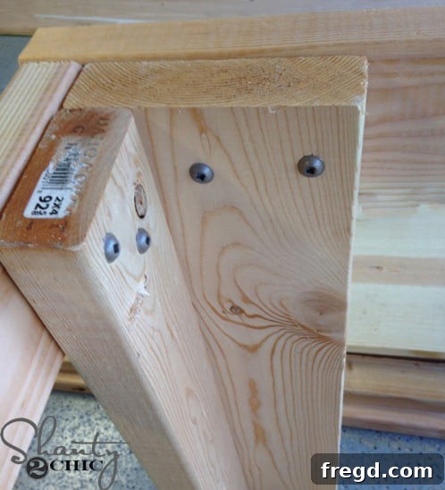 Crafting Your Ultimate Workspace 6 Attaching workbench legs to the frame