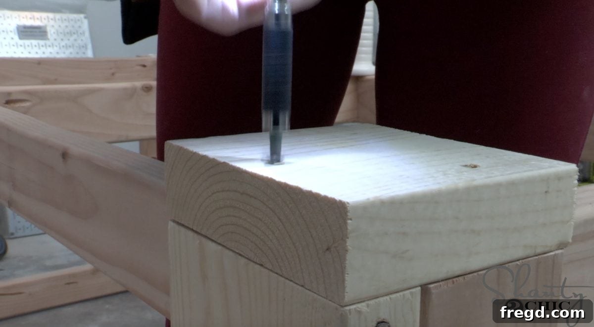 Crafting Your Ultimate Workspace 7 Attaching foot pads to the bottom of the workbench
