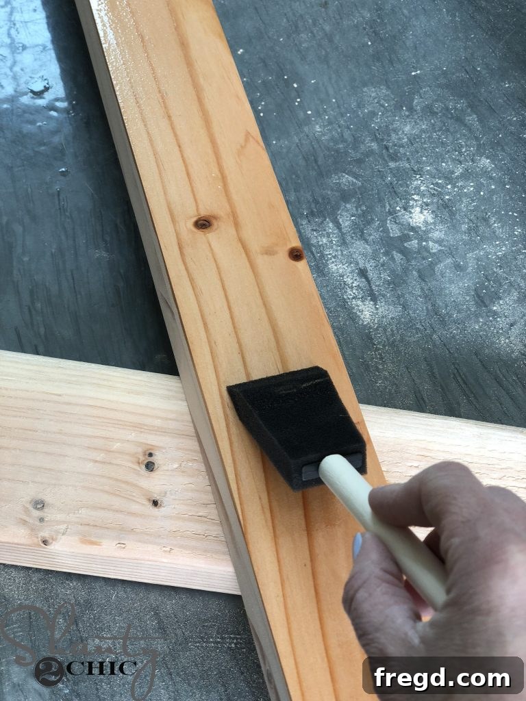 Rustic Barn Door Blanket Ladder 5 Applying Pre-Stain to Wood