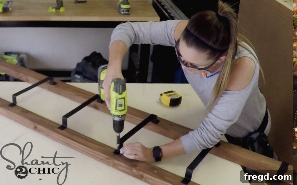 Rustic Barn Door Blanket Ladder 9 Securing Barn Door Pull with Drill