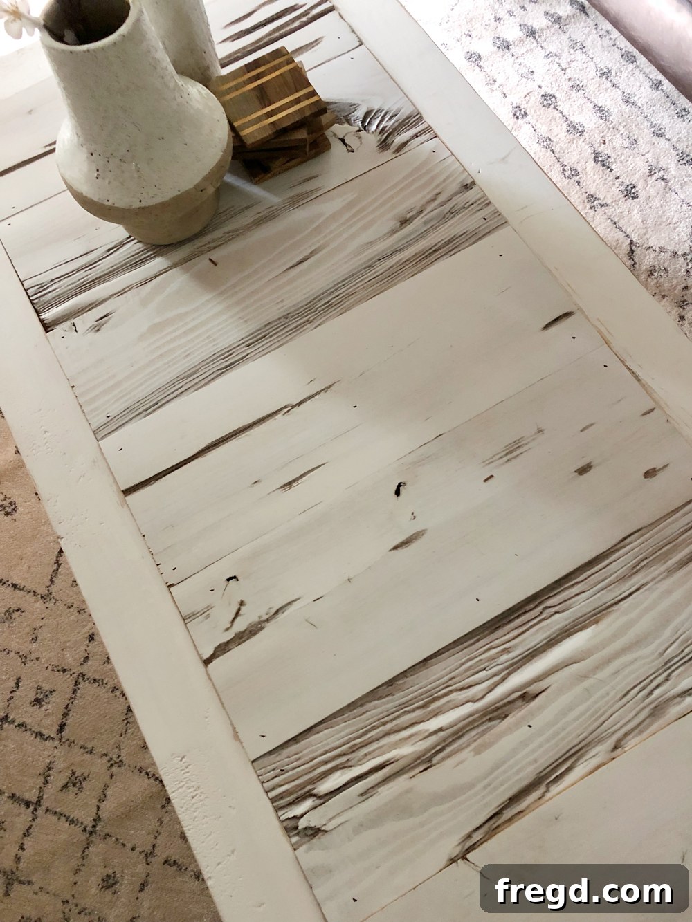DIY Reclaimed Barn Wood Rolling Coffee Table 8 Close-up of beautiful pre-finished barn wood planks, showcasing their unique texture and color, ready for installation on the coffee table top.