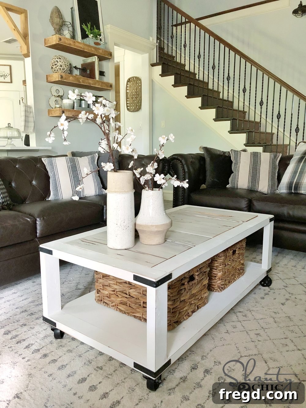 DIY Reclaimed Barn Wood Rolling Coffee Table 9 Stunning finished DIY Barn Wood Cart Coffee Table, beautifully styled in a farmhouse living room setting, perfect for rustic decor.